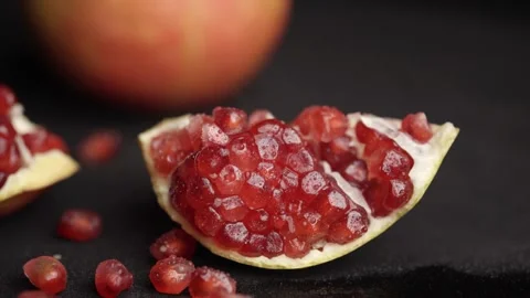 Water drops falling on grains of fresh ripe pomegranate Stock Footage 272184678