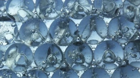Water drops falling on water surface Stock Footage 165031527