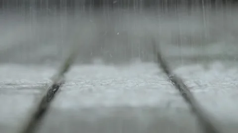 Water drops falling on a wooden deck. Rain water drop raining on the floor,.. Stock Footage 260433201