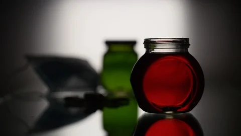 Water drops in the flask Stock Footage 125490446