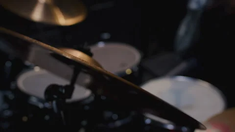 Water drops flying from drum kit. Drum player hits the cymbals of drum set Stock Footage 329546957