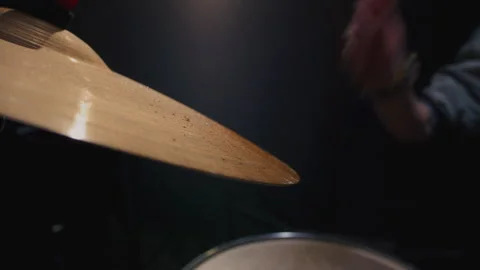 Water drops flying from drum kit. Drum player hits the cymbals of drum set Stock Footage 329547233