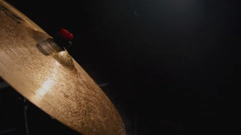 Water drops flying from drum kit. Drum player hits the cymbals of drum set Stock Footage 329547470