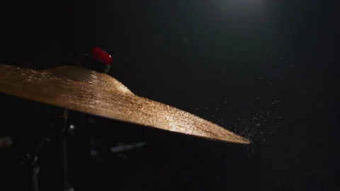 Water drops flying from drum kit. Drum player hits the cymbals of drum set Stock Footage 329547749