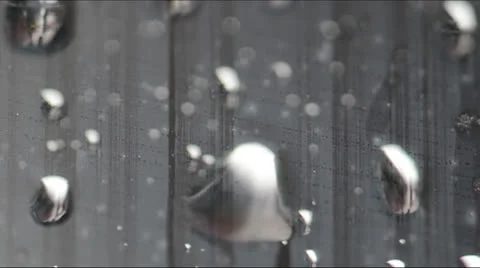 Water Drops on glass with Focus Pulls 140GYRD_2491 Pt1 NTSC Stock Footage 25234168
