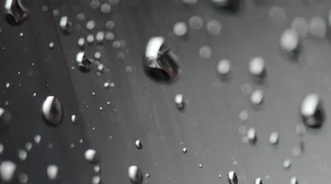 Water Drops on glass with Focus Pulls 140GYRD_2496 NTSC Stock Footage 25271588