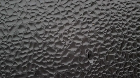 Water drops on glasses. Macro. Video stock 34507913