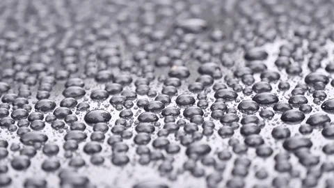 Water Drops on a Gray Background close-up. Water droplets background. Stock Footage 121285170