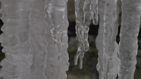 Water drops on icicles Stock Footage 97877537