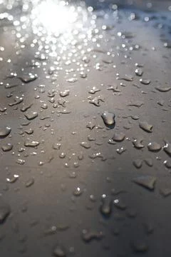 Water drops on light background texture. backdrop glass covered with drops of Stock Photos