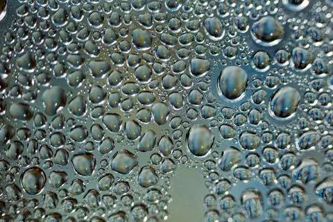 Water drops macro from a plastic bottle fifty megapixels Stock Photos