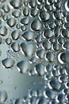 Water drops macro from a plastic bottle fifty megapixels Stock Photos