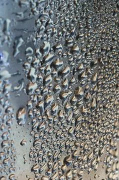 Water drops on metallic surface Stock Photos