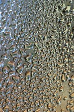 Water drops on metallic surface 스톡 사진