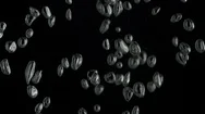 Water Drops Move Across Black Background Stock Footage