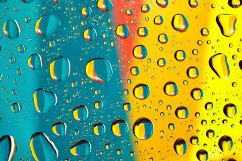 Water drops on multicolor background Stock Photos
