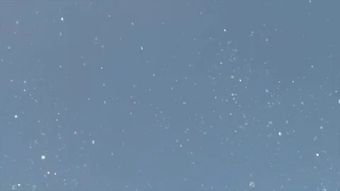 Water drops from the ocean waves in the air on the sky and clouds background Video stock 76901637