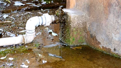 Water drops out from the cracks of the pipe.3 Stock Footage 104328027