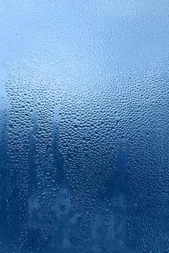 Water drops pattern on glass Natural water drops texture Copyright: xZoona... Stock Photos