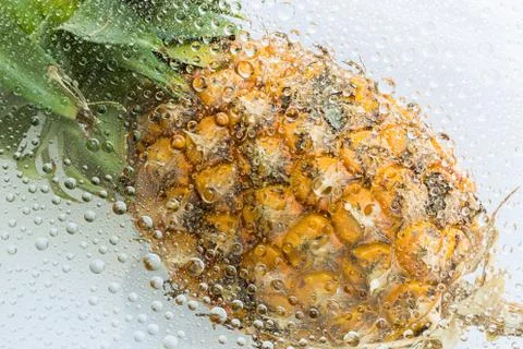Water drops of pineapple background Stock Photos