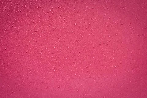 Water Drops On Red Background. Stock Photos