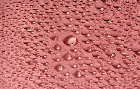 Water-drops on red Stock Photos