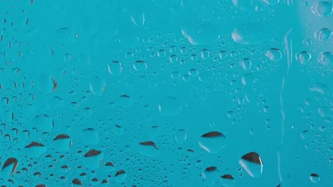 Water drops run down the glass Stock Footage 146816732