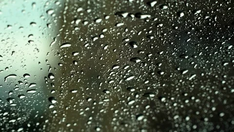 Water drops running down glass, close-up Stock Footage 280768366