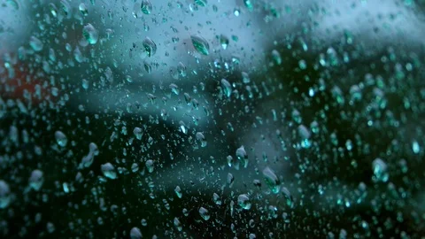 Water drops running on glass Stock Footage 100535684