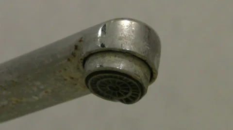 Water drops from a rusty faucet Stock Footage 28189613
