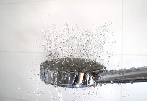 Water drops in a shower Stock Photos