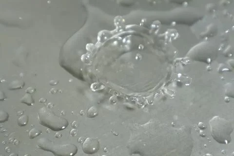 Water Drops on a Silver Background Foto stock