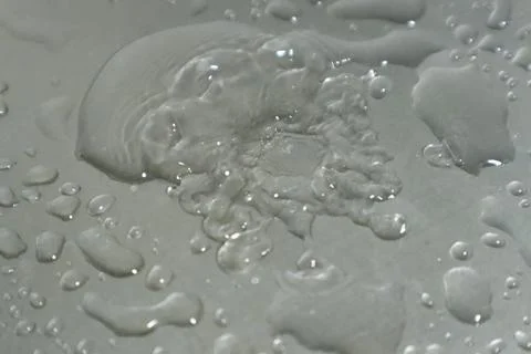 Water Drops on a Silver Background 스톡 사진
