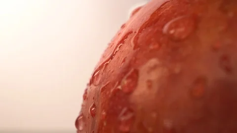 Water Drops Sliding on an Apple, Macro Stock Footage 122653615