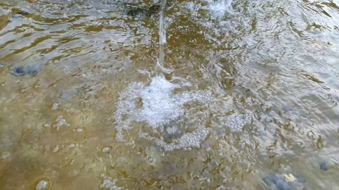 Water drops splash on the water surface Stock Footage 140378142