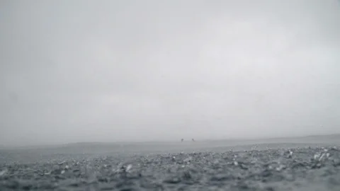 Water drops splashing on the surface of sea wave Stock Footage 108644295