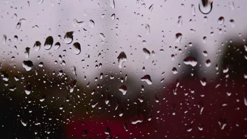 Water drops stream down on window glass after heavy rain in bad autumn weather Stock Footage 163186263