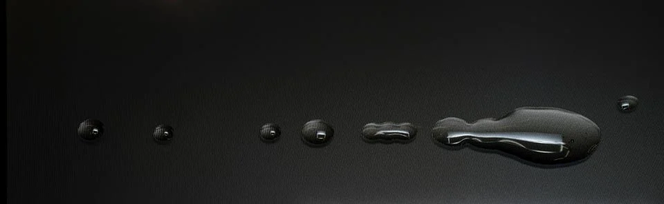 Water drops on the surface of a LCD screen, macro shoot Stock Photos