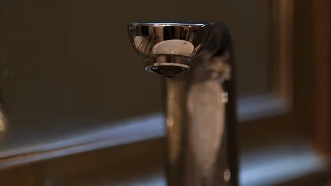 Water drops from a tap Video stock 108547650