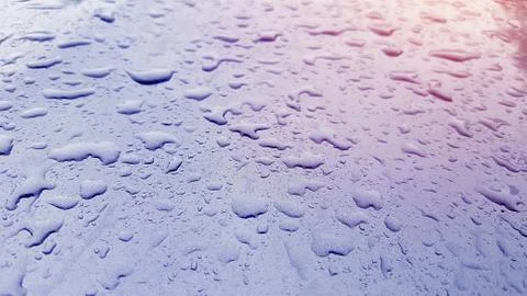 Water drops texture on car surface with metalic color texture Stock Photos