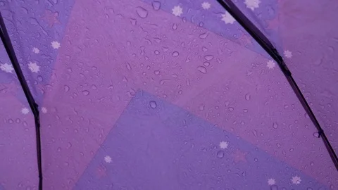 Water drops on an umbrella Stock Footage 107491144