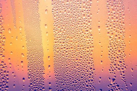 Water drops at vibrant background Stockfoto's