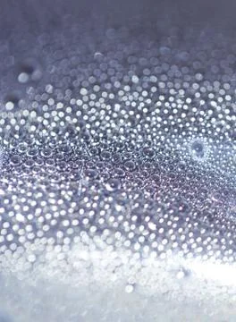 Water drops an white background Stock Photos