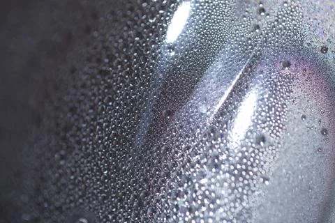 Water drops an white background Stock Photos