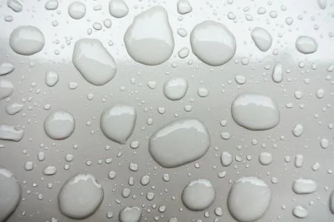 Water drops an white background Stock Photos