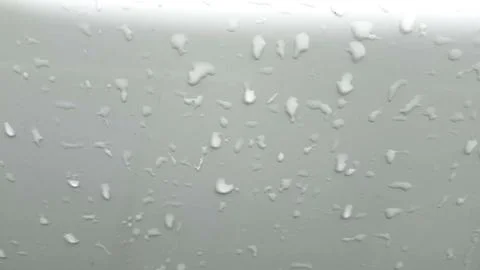 Water drops on white background Stock Photos