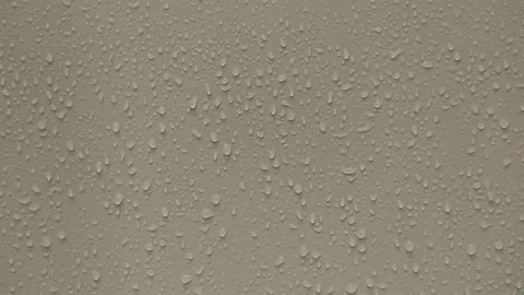 Water drops on a white surface. Video stock 150185760