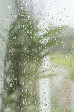 Water drops on window. Background of drops of water rain on glass transparent Stock Photos