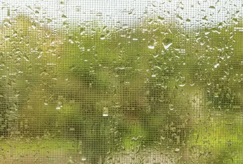 Water drops on window. Background of drops of water rain on glass transparent Stock Photos
