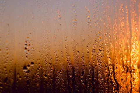 Water drops on a window, on a cold winter morning. Photos